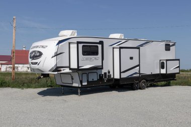 Bunker Hill - Circa August 2022: Cherokee Arctic Wolf fifth wheel travel trailer. Arctic Wolf is a division of Forest River.