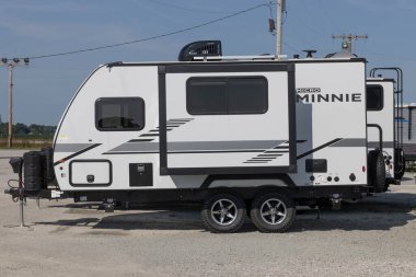 Bunker Hill - Circa August 2022: Winnebago Minnie Winnie travel trailer. Winnebago is a manufacturer of RV and motorhome vacation vehicles. clipart