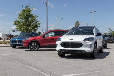 Muncie - Circa August 2022: Ford Escape display at a dealership. Ford offers the Escape in S, SE, Hybrid and Titanium models.