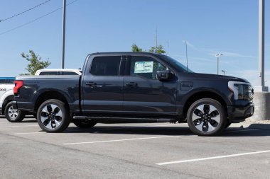 Muncie - Circa August 2022: Ford F-150 Lightning display. Ford offers the F150 Lightning all-electric truck in Pro, XLT, Lariat, and Platinum models.