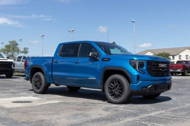 Muncie - Circa August 2022: GMC Sierra 1500 Elevation display. The GMC Sierra 1500 is available in a variety of models and exterior packages.