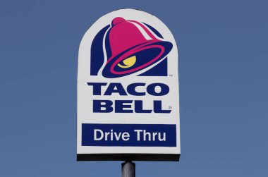 Indianapolis - Circa August 2022: Taco Bell fast food restaurant. Taco Bell serves Mexican-inspired food and is a subsidiary of Yum!