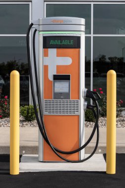 Noblesville - Circa September 2022: ChargePoint EV Charging Station. ChargePoint plug-in vehicle stations are in business parking lots or home use. clipart