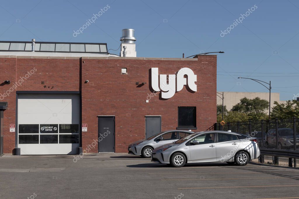 Chicago - Circa October 2022: Lyft Driver Center. Lyft offers ride-hailing, vehicles for hire, rental cars, and food delivery services.