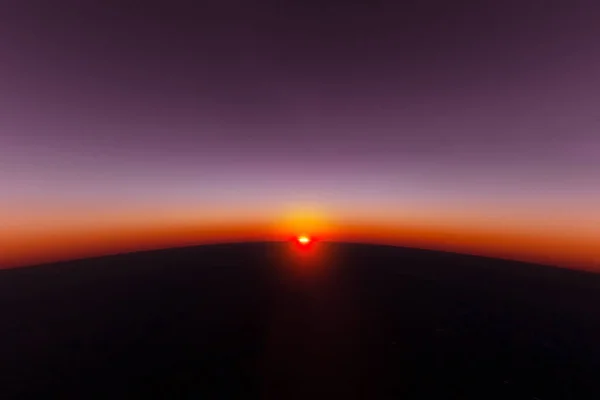 Vista impressionante de pôr-do-sol de uma aeronave — Fotografia de Stock