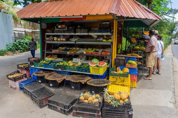 Mauritius, December 2021 - Fruit and vegetable seller kiosk in a tourist area of Grand Baie