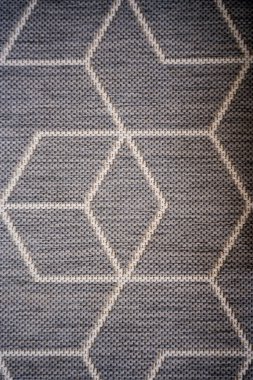 Background - grey carpet with gemometric shapes. High quality photo