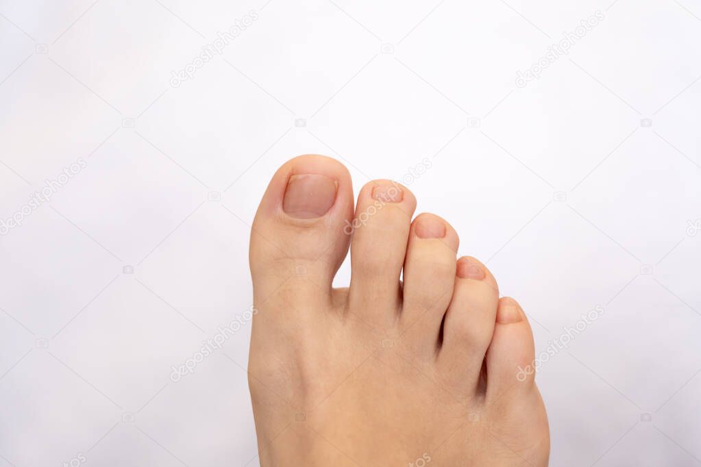 Closeup of female feet and toes. Healthy feet concept