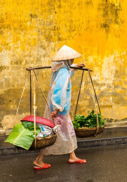 Vietnamese woman street seller In hoi an Vietnam in ancient town HoiAn