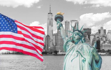 Arka planda büyük Amerikan bayrağı olan Özgürlük Anıtı.