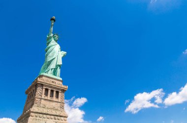 Statue of Liberty in New York City, USA with blue sky