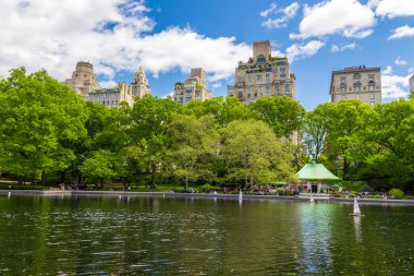 Miniature remote-controlled sailboat in Conservatory Water pond in the Central Park, New York