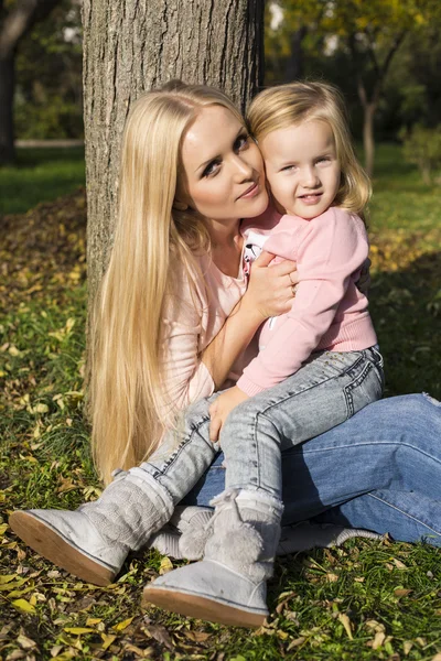 Beautiful mother with little cute daughter — Stock Photo, Image