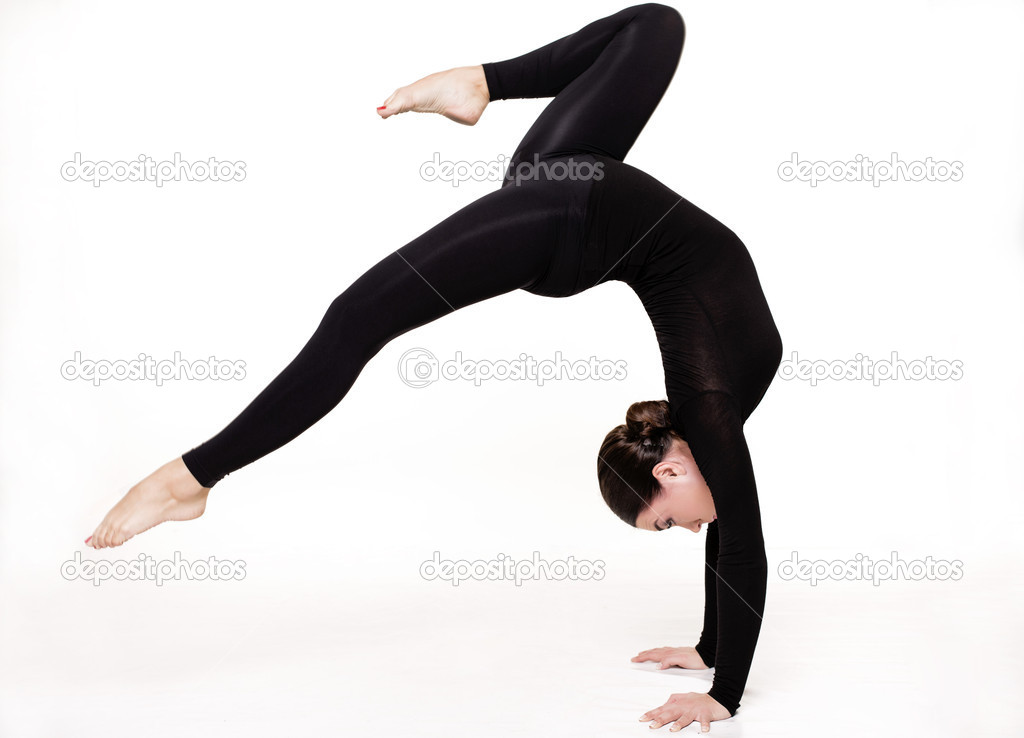 woman with sportive sexy body doing acrobatic