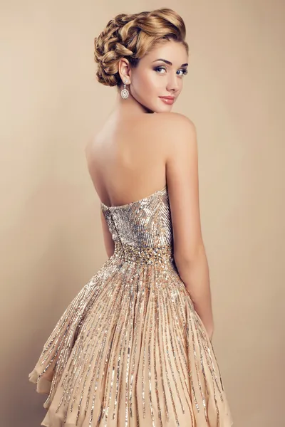 Beautiful blond woman in elegant  dress — Stock Photo, Image