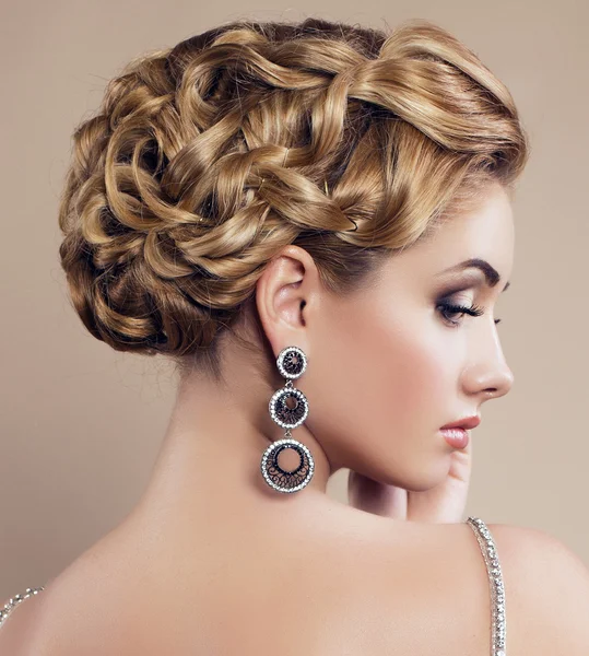 Portrait of beautiful girl with blond hair with jewellery — Stock Photo, Image