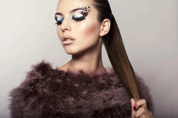 Beautiful model with fantastic eyes makeup — Stock Photo, Image