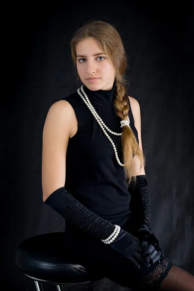 Girl in black dress — Stock Photo, Image