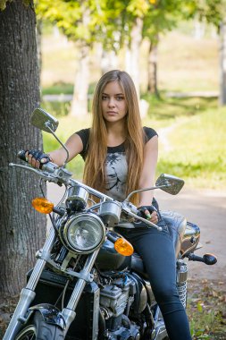 Young girl a motorbike