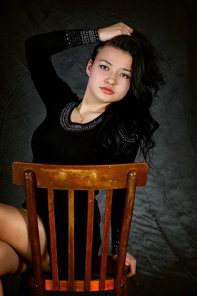 Girl in black dress — Stock Photo, Image