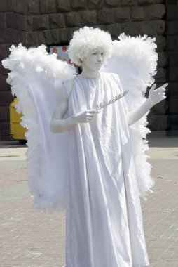 meleğin görüntüsünü tanımlanamayan busking Mim