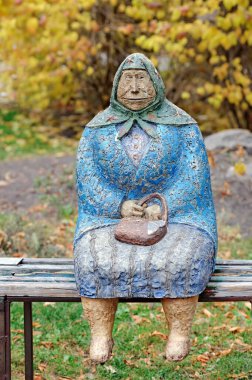 Monument to the classical grandmother in park Shevchenko in Kyiv Ukraine