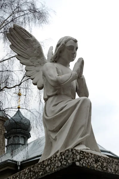 Traditional Praying Angel Sculpture Outdoors Ternopil Ukraine - Stock-foto