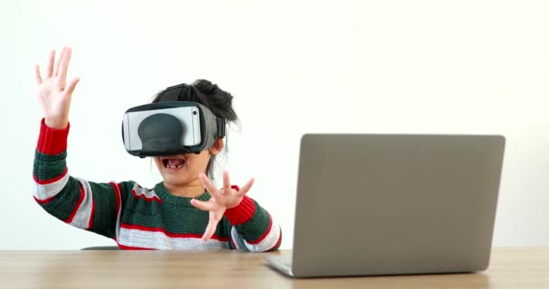 Little Girl Wearing Sitting Desk Home Glasses Virtual Global Internet — Stock Video