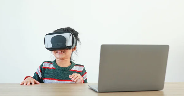 Little Girl Wearing Sitting Desk Home Glasses Virtual Global Internet — Fotografia de Stock