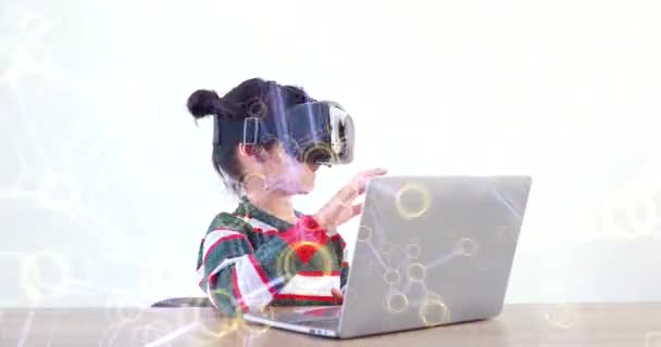 Little Girl Wearing Sitting Desk Home Glasses Virtual Global Internet — стоковое видео