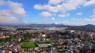 DA LAT CITY, VIETNAM - JULY 15,2022 : Landscape in the city of Da Lat city, Vietnam is a popular tourist destination. Tourist city in developed Vietnam. ( view aerial from drone )