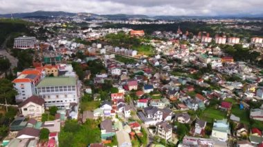 DA LAT CITY, VIETNAM - JULY 15,2022 : Landscape in the city of Da Lat city, Vietnam is a popular tourist destination. Tourist city in developed Vietnam. ( view aerial from drone )