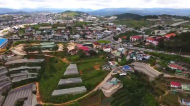 DA LAT CITY, VIETNAM - JULY 15,2022 : Landscape in the city of Da Lat city, Vietnam is a popular tourist destination. Tourist city in developed Vietnam. ( view aerial from drone )