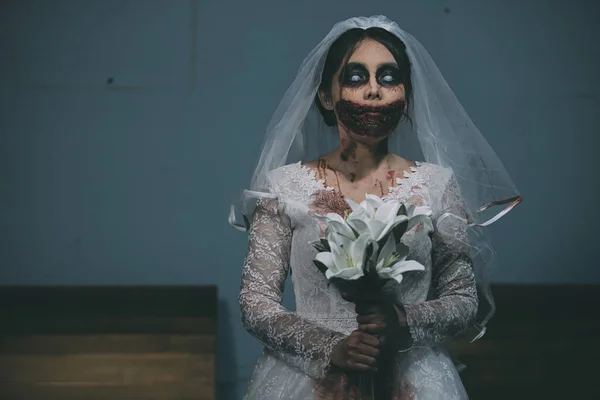Portrait of asian woman make up ghost bride death and blood the horror is darkness scary horror scene for background,Halloween festival concept