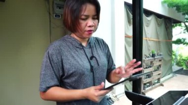 close-up footage of asian woman running on treadmill