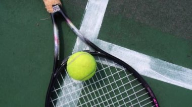 footage of tennis racket on court