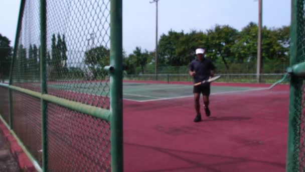 Footage Man Training Play Tennis Outdoor Court — Stockvideo