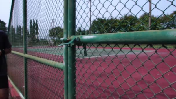 Footage Man Training Play Tennis Outdoor Court — Stockvideo