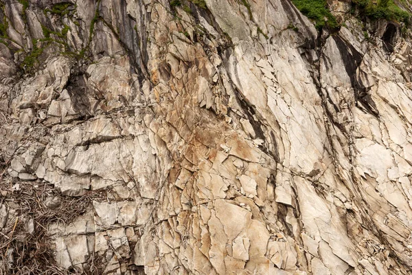 Formations of rocks. Rock face background