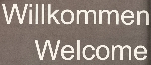 Vítejte Němčině Angličtině Slova Zdi Panoramatický Obrázek — Stock fotografie