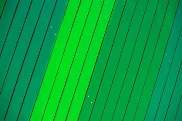 Wooden green background. Wooden slats in different shades of green