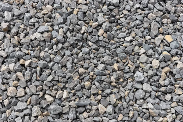 Gray gravel stones. Gravel stones background