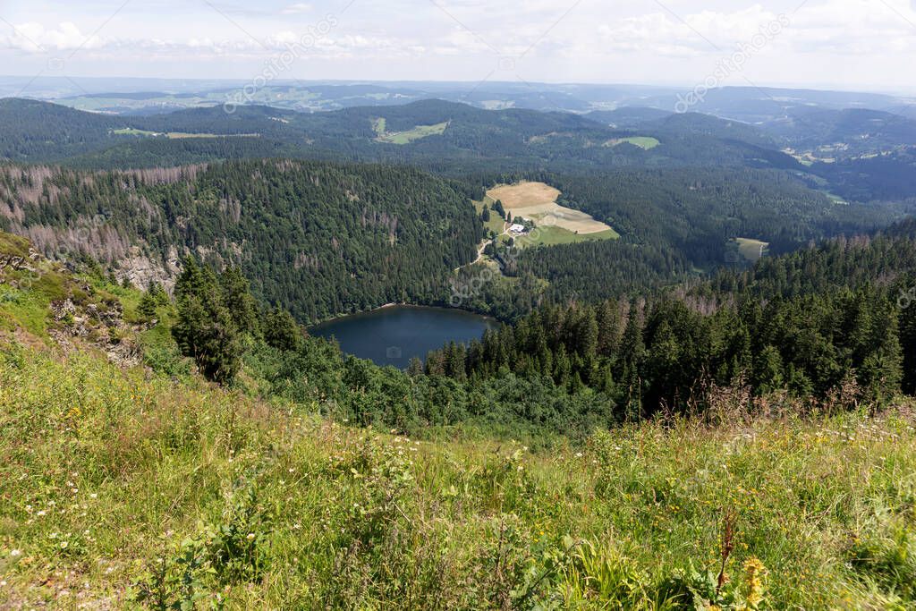 Landscape and lake Feldsee from mountain Feldberg. Black Forest. Germany