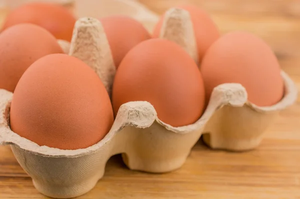 Farm-Fresh Brown Eggs in a Paper Carton