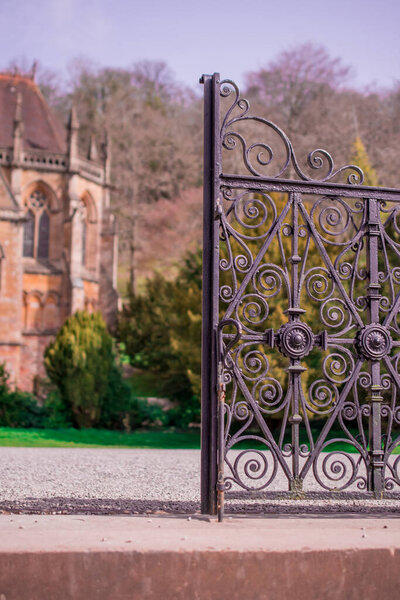 Details of metal gold decorated gate fragment.