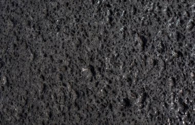 Volkanik siyah kumun yakın plan resmi.