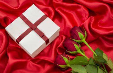 red sexy background with  gift box and necklace