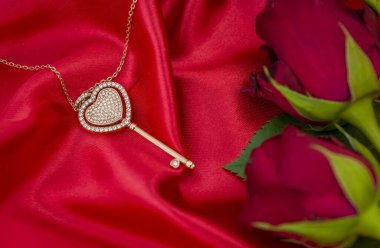 red sexy background with  gift box and necklace