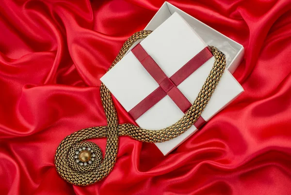 Red Sexy Background Gift Box Necklace —  Fotos de Stock