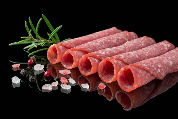 Rebanadas Salami Con Hierbas Sobre Fondo Negro —  Fotos de Stock